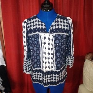 Blue and white flowery blouse